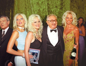 Kissinger socializes with a trio of <i>U.S. News & World Report</i> Copy Girls hours before the outburst.